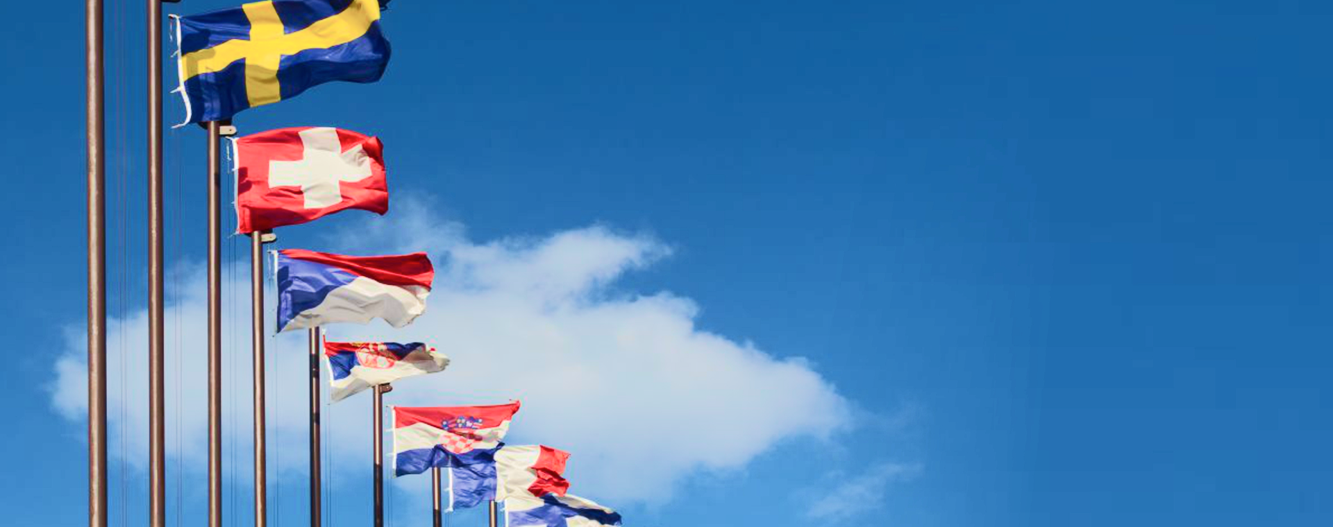 Global handshake with international flags