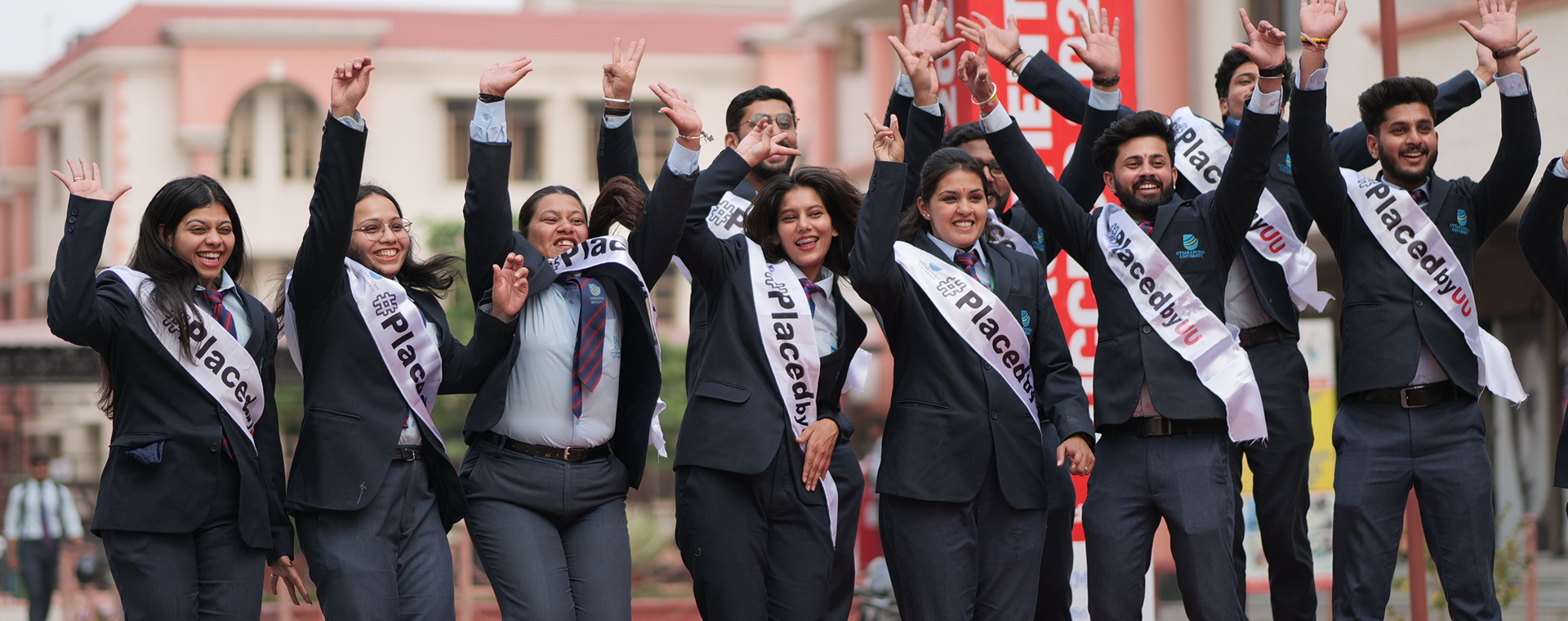 Successful Uttaranchal University students celebrating their placements
