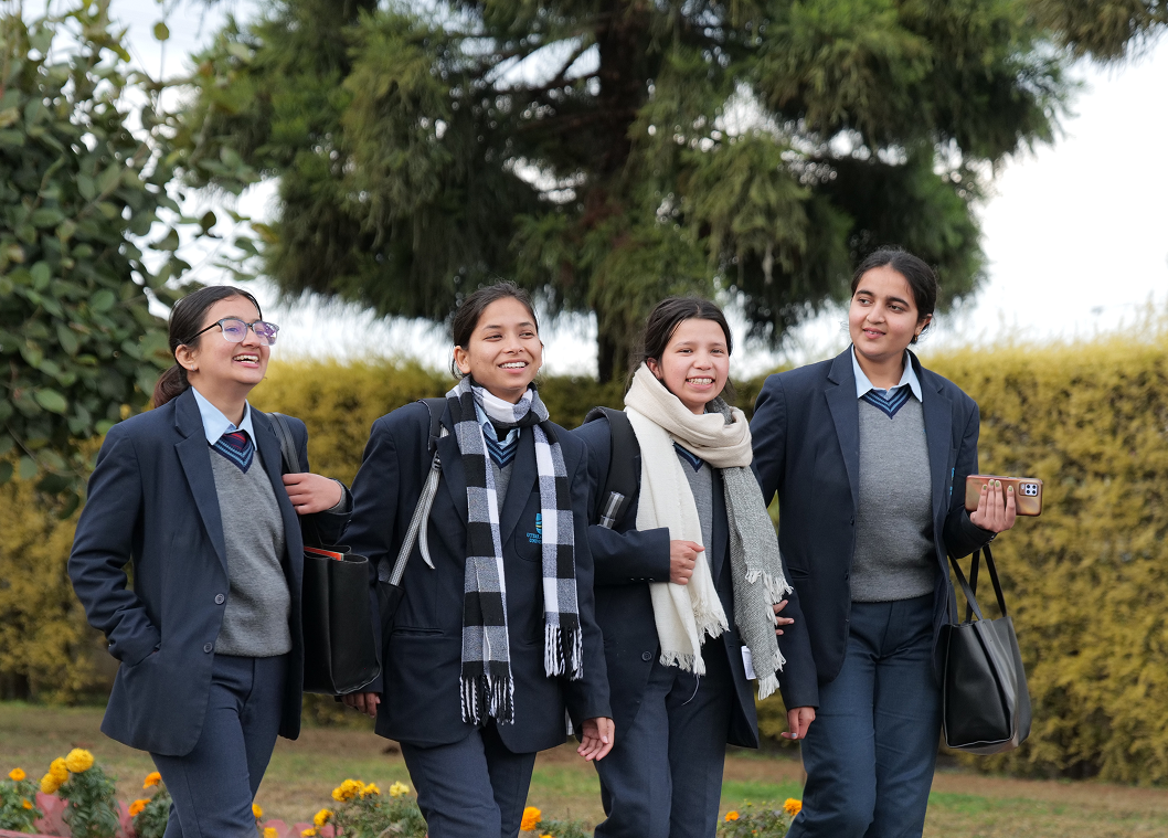 University campus with students walking between buildings