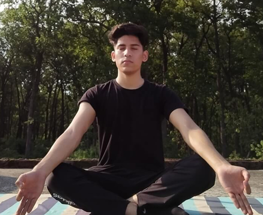 International Yoga Day - Student practicing yoga