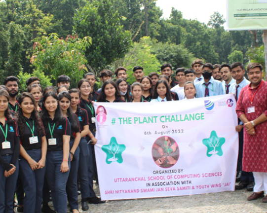 Plantation Drive - Students with THE PLANT CHALLENGE banner